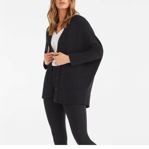 Vetta Convertible Black Oversized Sweater. Converts to a turtleneck sweater